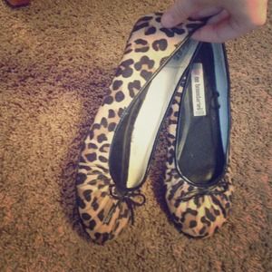 Cheetah size 6.5 shoes. Worn only once.