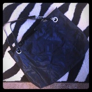 Black Venigue, never used purse.