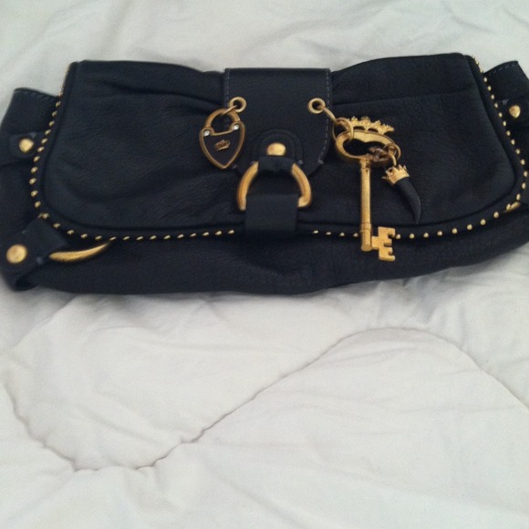 Juicy Couture clutch. REDUCED to 55.00