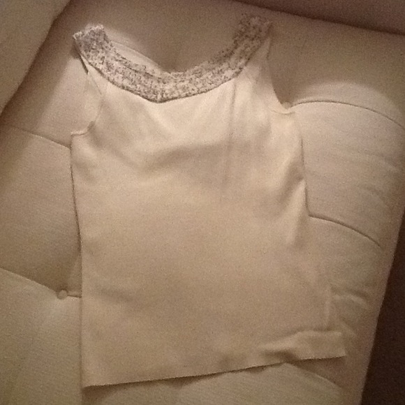 Beaded sleeveless dressy top.