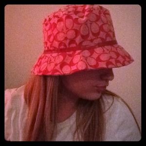 A red coach hat Authentic.