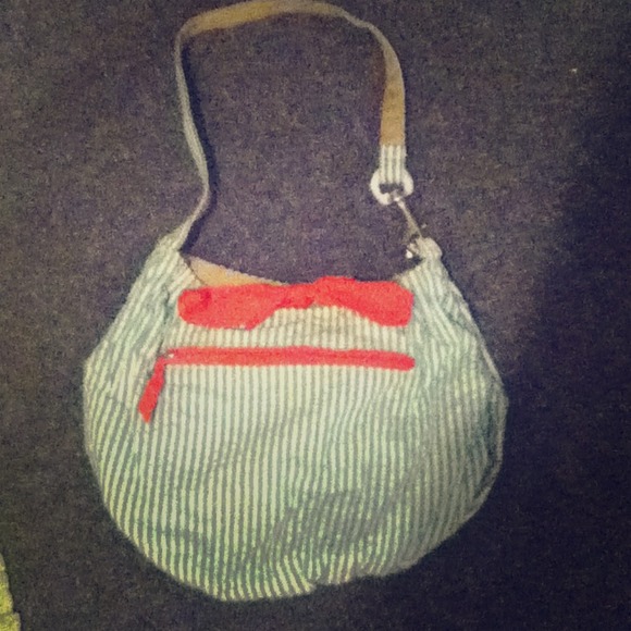 Green and white purse