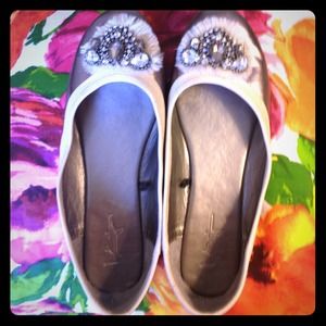 Flats with pretty design on top