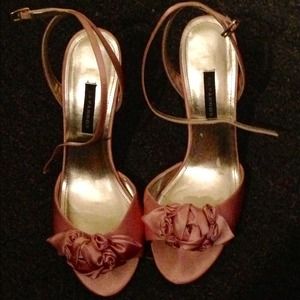 Pink heels with flower detail. Size 8