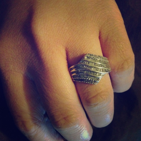 Silver ring with accent diamonds