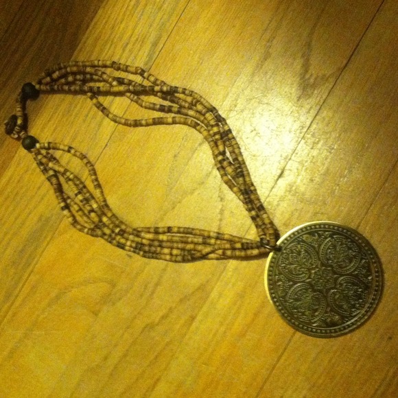 Wood bead necklace w/metal pendant