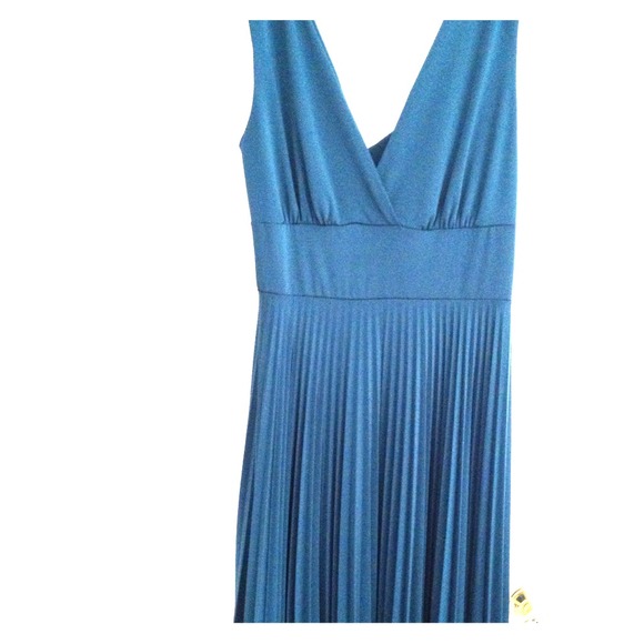 Unworn dress beautiful sea green. Hits above knees