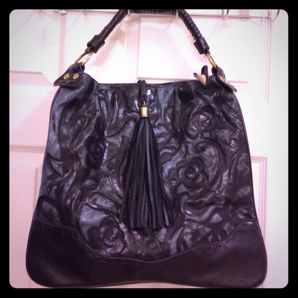 Beautifully patterned navy blue handbag