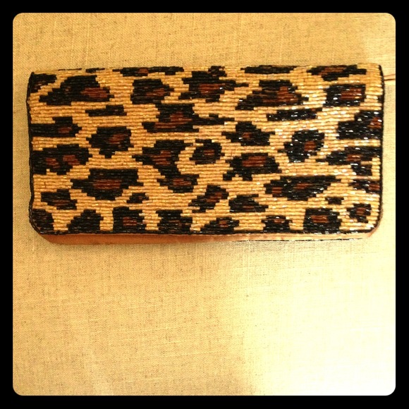 Neiman Marcus Leopard print clutch.