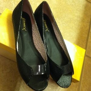 Black peep toe flats never worn