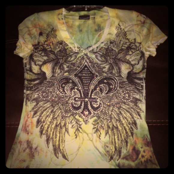 Beaded top with angel wings.