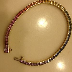 Multi Colored Sapphire bracelet. 14 KT Gold trim