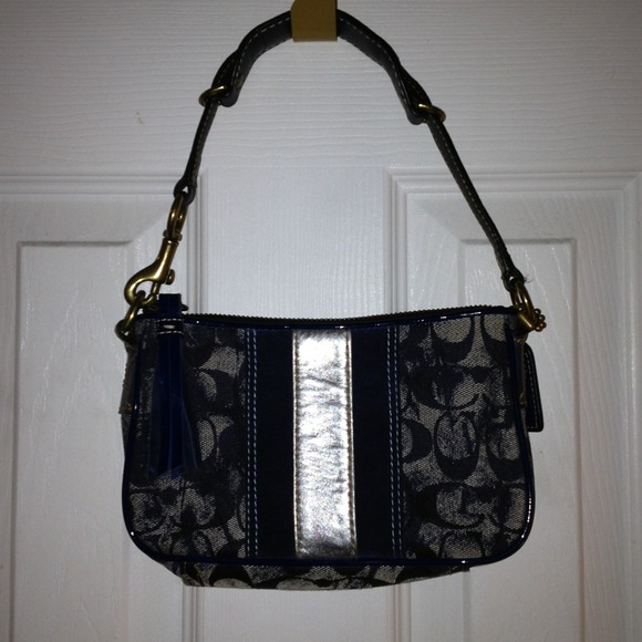 RESERVED for @kimberholdeman Coach purses