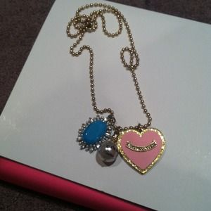 Authentic juicy couture long necklace with charms