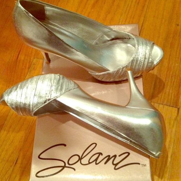 Price ✂ Silver open toe heels. Worn once.