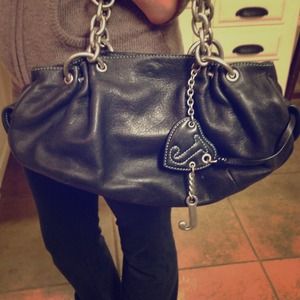 Black leather juicy couture purse with metal!