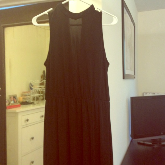 Long sexy black dress with slit and cut out.