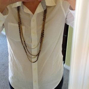 Gold and purple necklace.