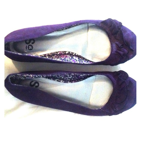 So purple flats with ruffles
