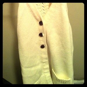 Cream ROXY knit vest.