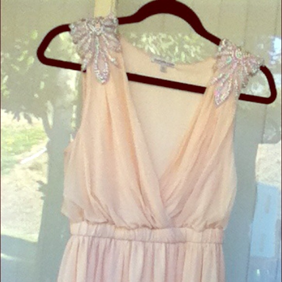 Light tan spring dress with embroidered shoulders