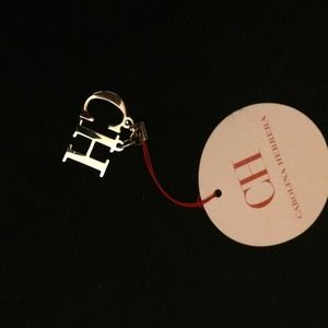 Reduced authentic carolina Herrera cellphone charm