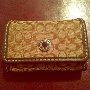 Coach contact lense holder