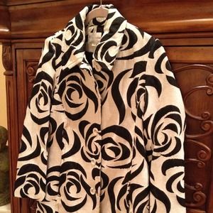 Black and white knee length jacket.