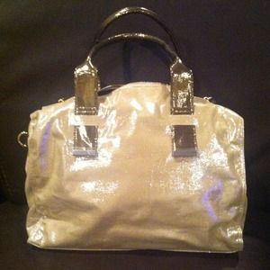 Sparkle light weight bag with inside pockets.
