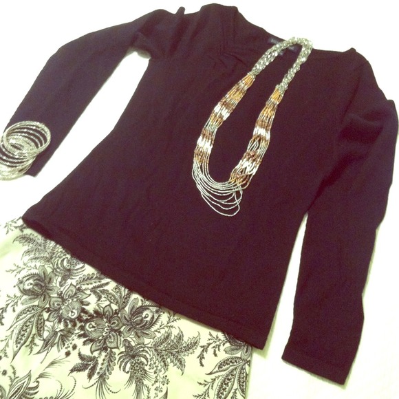 black asymmetrical sweater