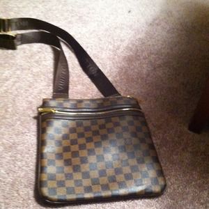 cross Louis Vuitton bag
