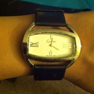 Cartier leather strapped watch