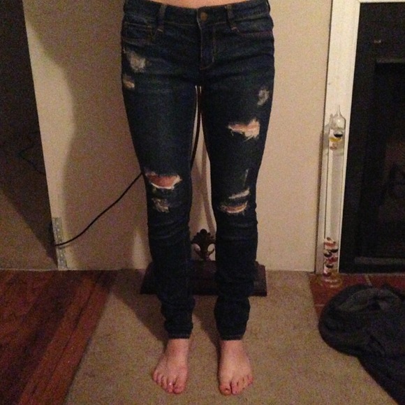 Distressed jeans.