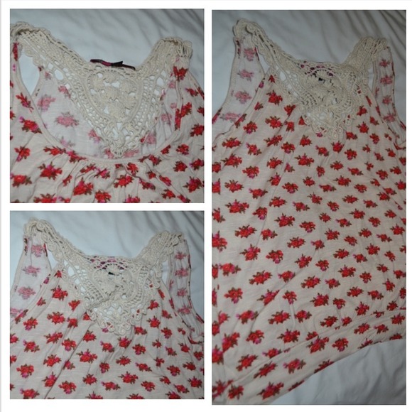 Cream top with red flowers