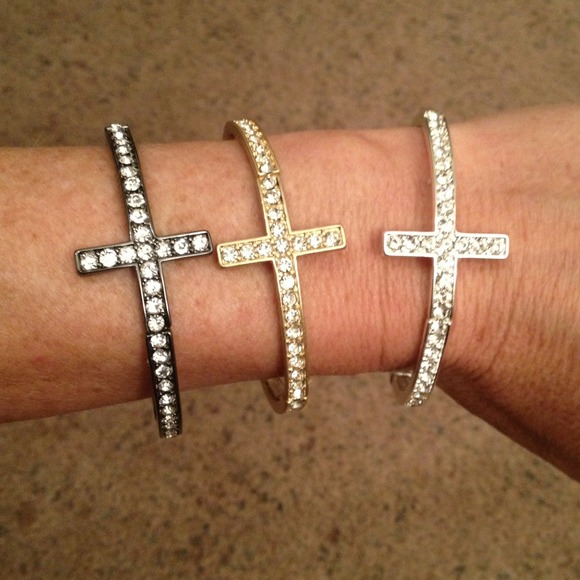 Bundle of 3 cross bracelets.Silver, gold, gunmetal