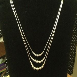 "Liquid silver" 3 chain beaded necklace.
