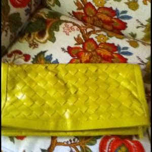 Oversized fold over clutch.