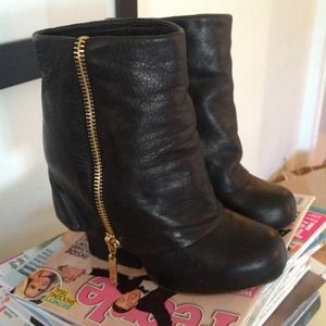 SOLD! Dolce Vita black leather zip booties.
