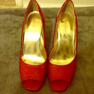 *Red patent leather heels
