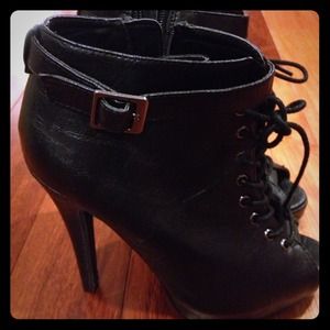 Open toe high heeled shoes