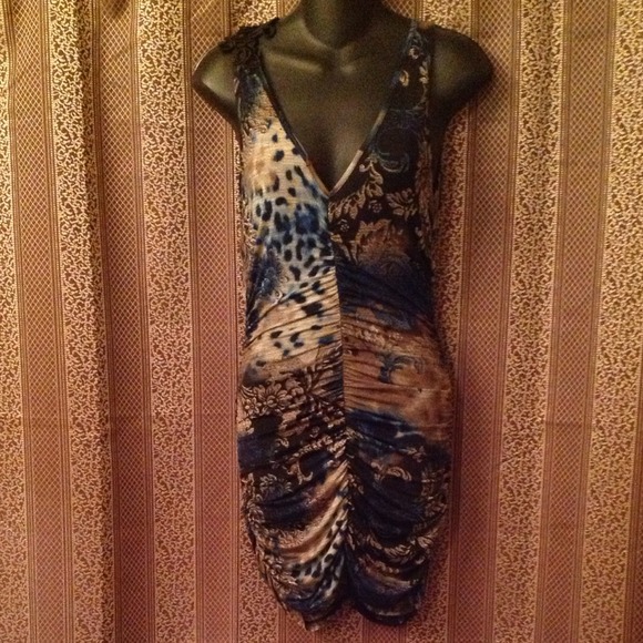 Dresses & Skirts - 🌹Reserved🌹Beautiful ruched animal floral dress.