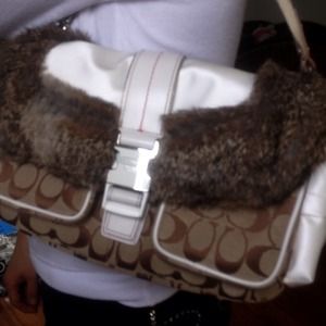 Coach rabbit fur coach hangbag .
