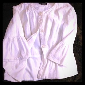 White jacket, cream overcoat and black silky shirt