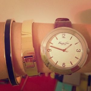 Kenneth Cole purple belt watch. slight scratch