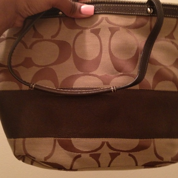 Real coach purse.Going for $120. Serious inquiries
