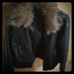 Black, greyish jacket with faux around the collar.