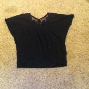 Cute black shirt with knit design on top back neck
