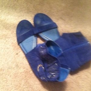 3 Pair of Sandles a pair and a pair oforange boots