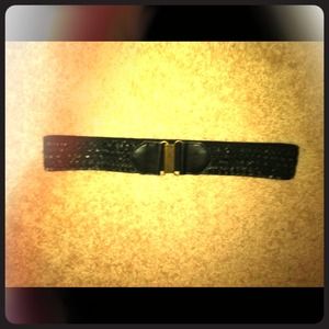 Ruffled, pleather black belt.