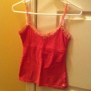 Orange striped tank top.